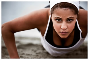 athletic-woman-doing-a-push-up